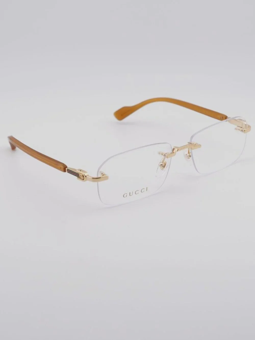 Gucci GG1221O 006 Rimless Eyeglasses Gold 56mm Rectangle Frame